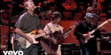 Paul McCartney, Eric Clapton performing While My Guitar Gently Weeps